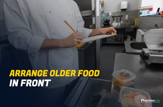 Arranging older food items in front for easy access