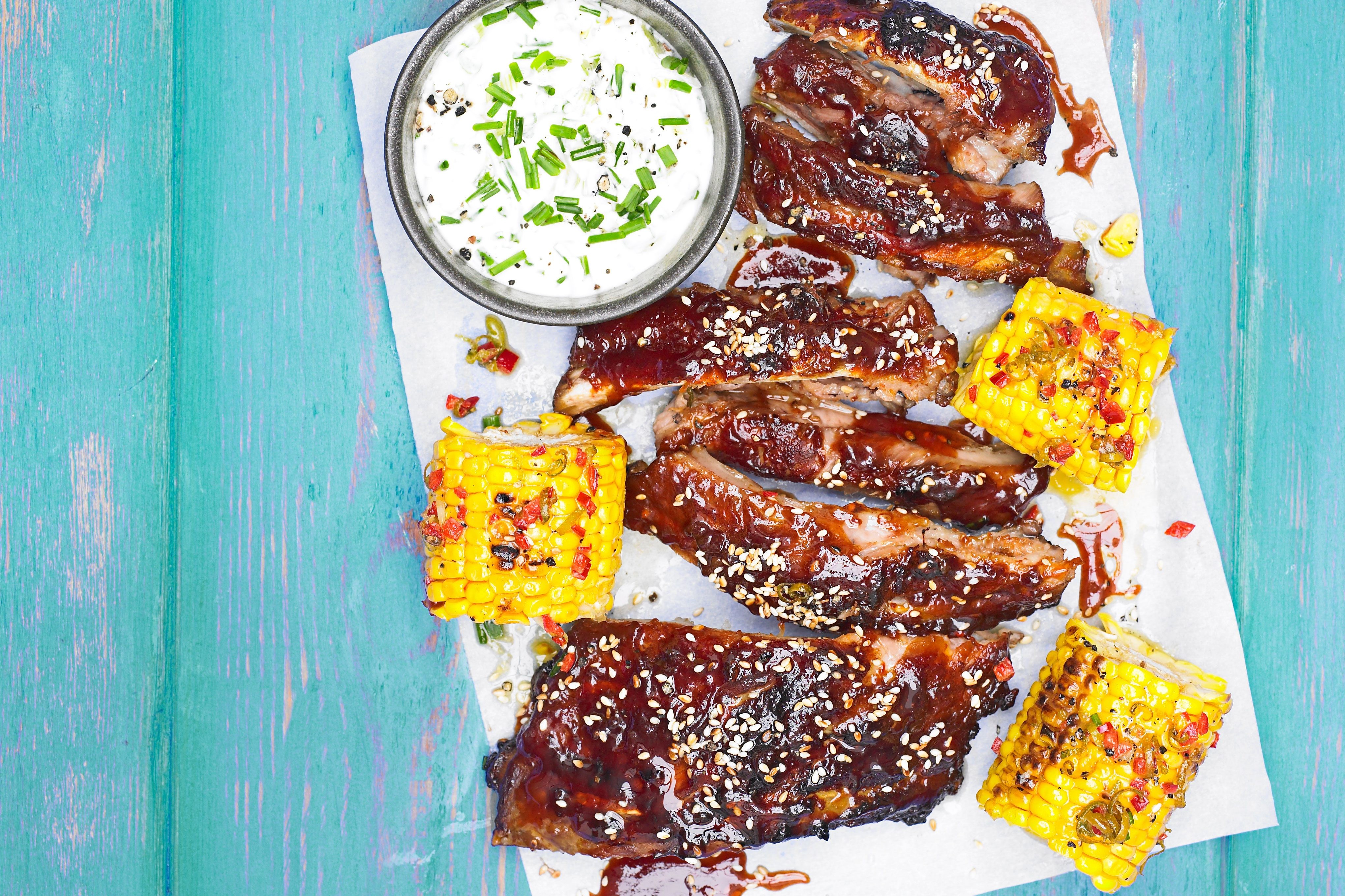 BBQ ribs with chive dip and sweetcorn