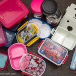 Variety of bento lunch boxes showcasing different shapes and sizes, ideal for various meal options.