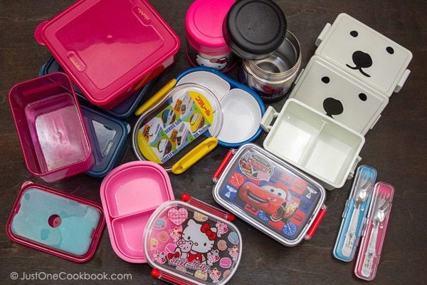 Variety of bento lunch boxes showcasing different shapes and sizes, ideal for various meal options.