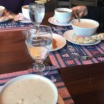 Bowl of clam chowder with oyster crackers