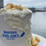 Bowl of New England Clam Chowder with oyster crackers