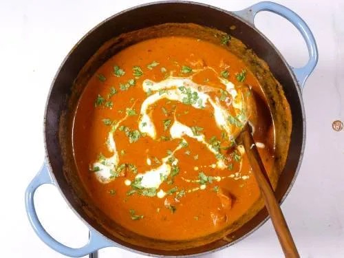 Stirring Cream into Butter Chicken