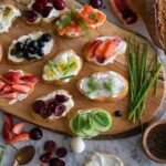 Assortment of canapés with various toppings on French bread