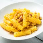 Pasta alla Carbonara, a creamy and rich Roman classic made with guanciale, egg yolks, pecorino cheese, and black pepper