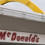 A classic McDonald's sign, representing the history of fast food breakfast