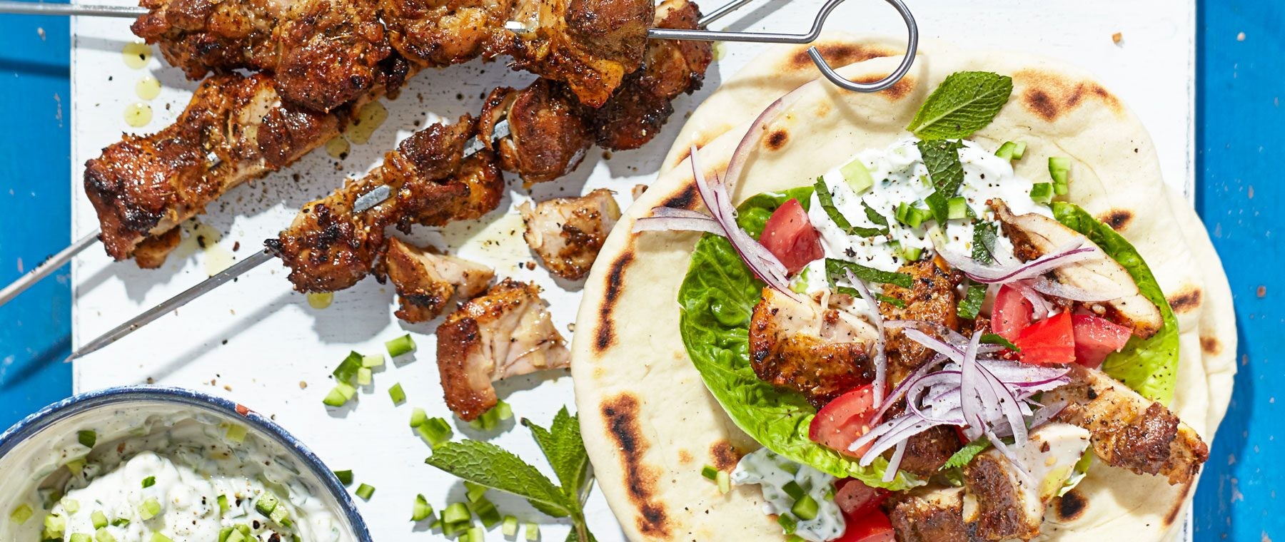 Chicken skewers and flatbread