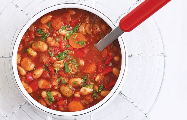 A hearty bowl of vegetable and bean goulash, showcasing the rich textures and colors of this protein-packed dish