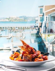 Cioppino with wine, showcasing the vibrant flavors of San Francisco