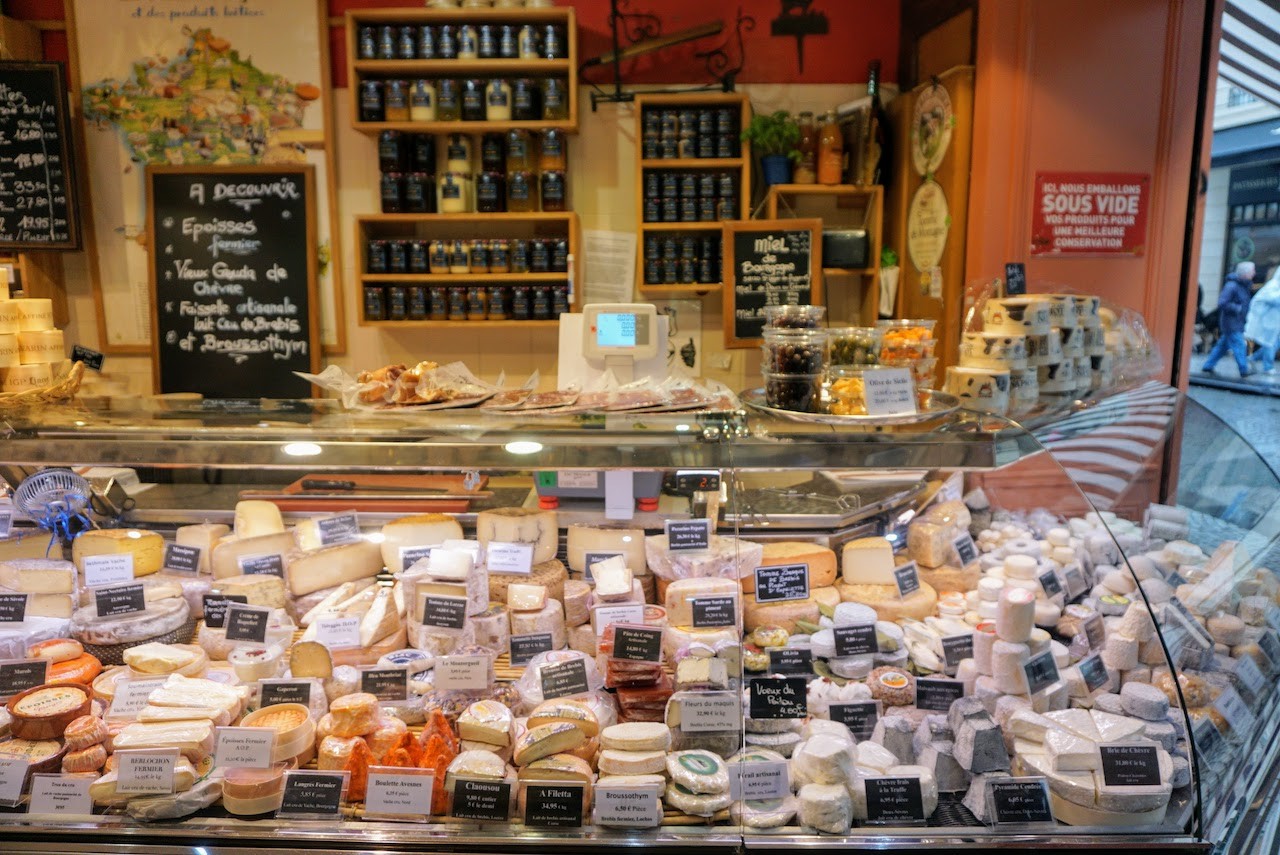 A cheese counter at Fromagerie Laurent Dubois in Paris
