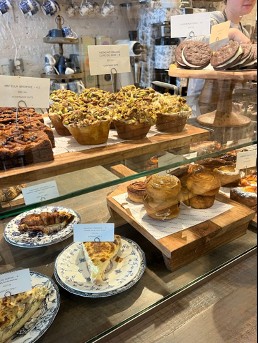 Colorful array of dishes displayed in a cozy, modern restaurant setting