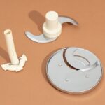 Cuisinart Custom 14-Cup Food Processor accessories with S-blade, slicing disc, and grating disc
