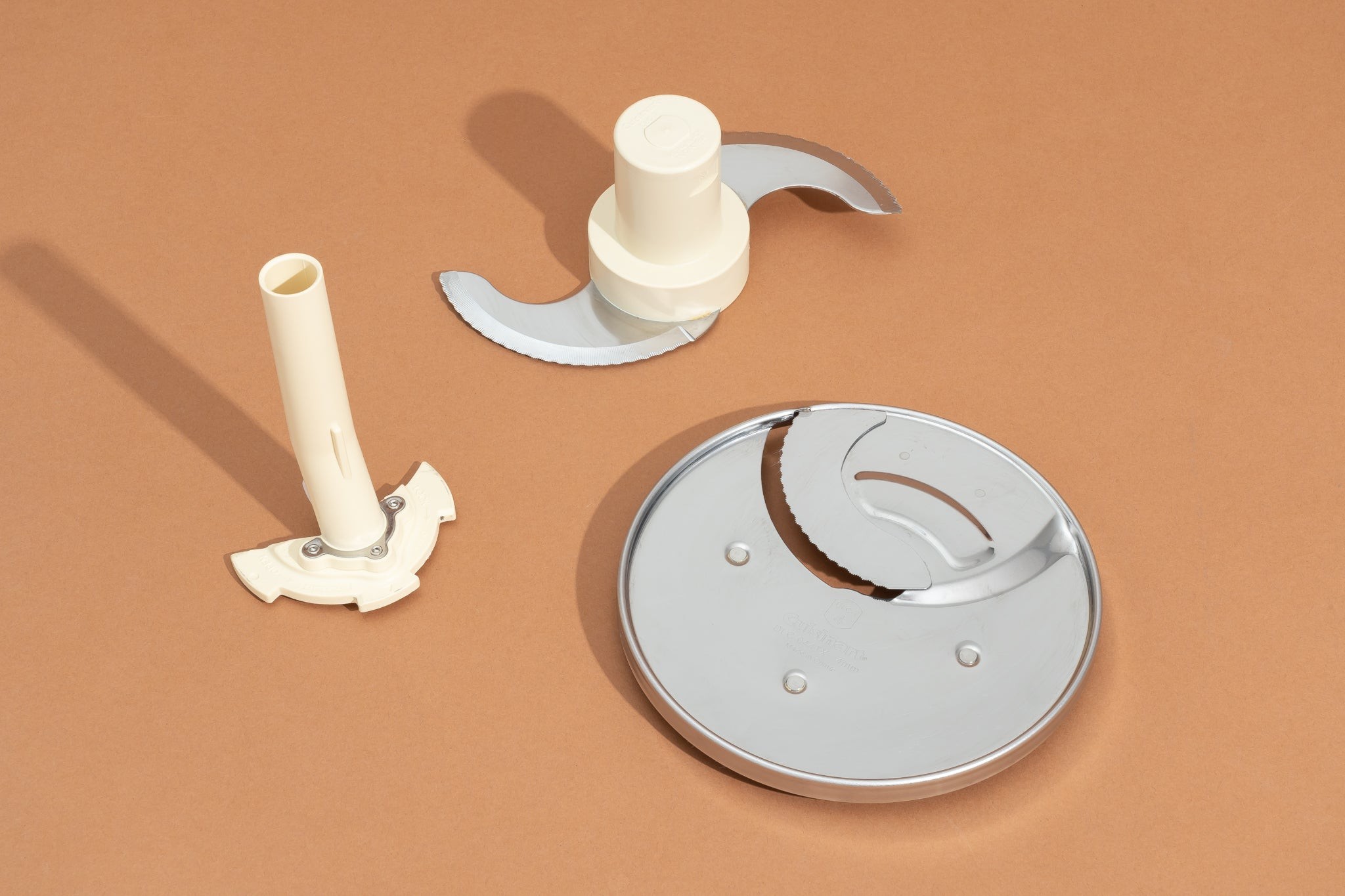 Cuisinart Custom 14-Cup Food Processor accessories with S-blade, slicing disc, and grating disc