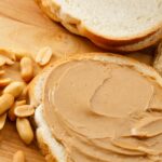 Person experiencing skin rash due to food allergy