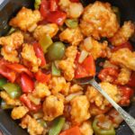 Gluten Free Sweet and Sour Chicken with bell peppers and pineapple