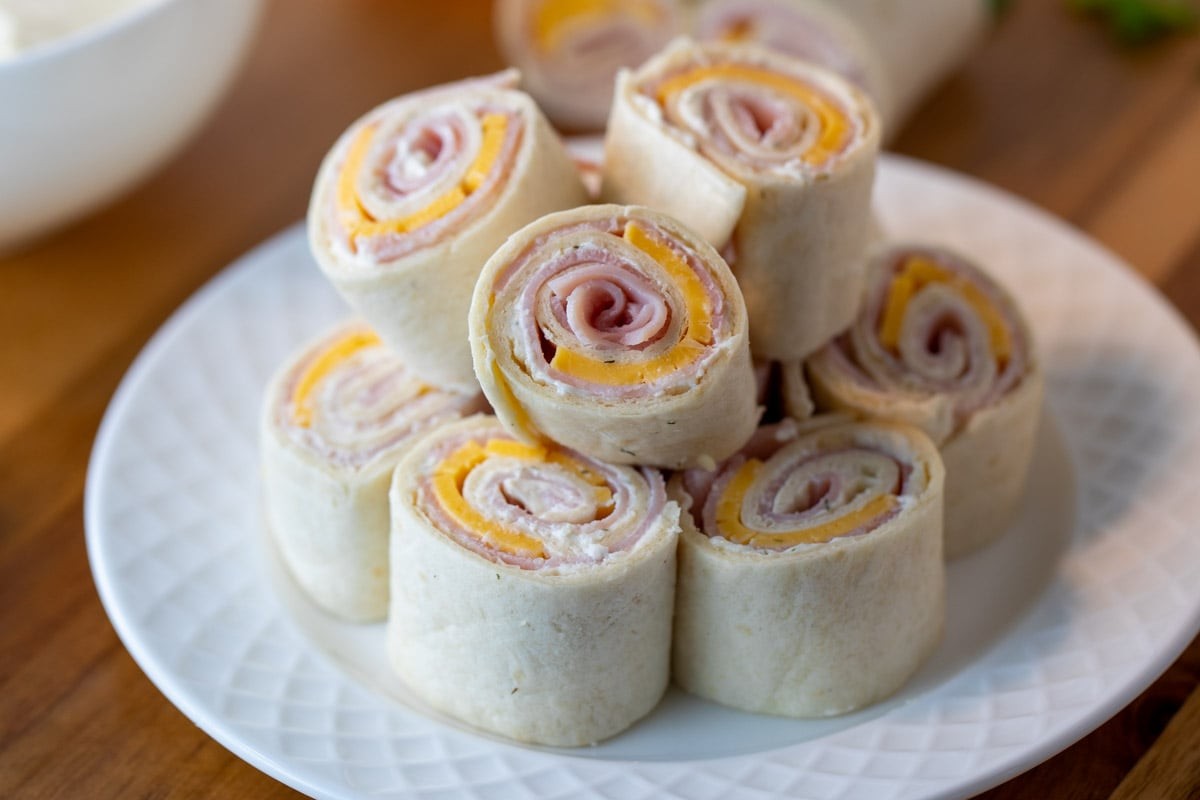 Taco Pinwheels ready to serve, showcasing seasoned ground beef, salsa, cheese, and black olives