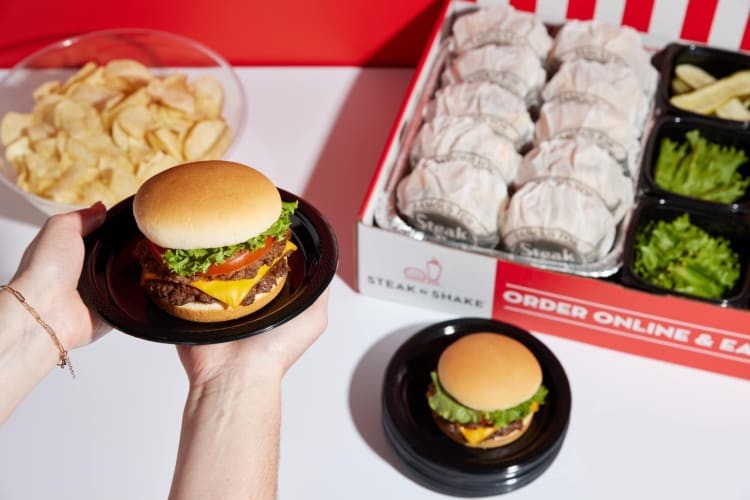 Steakburgers plus a catering box.