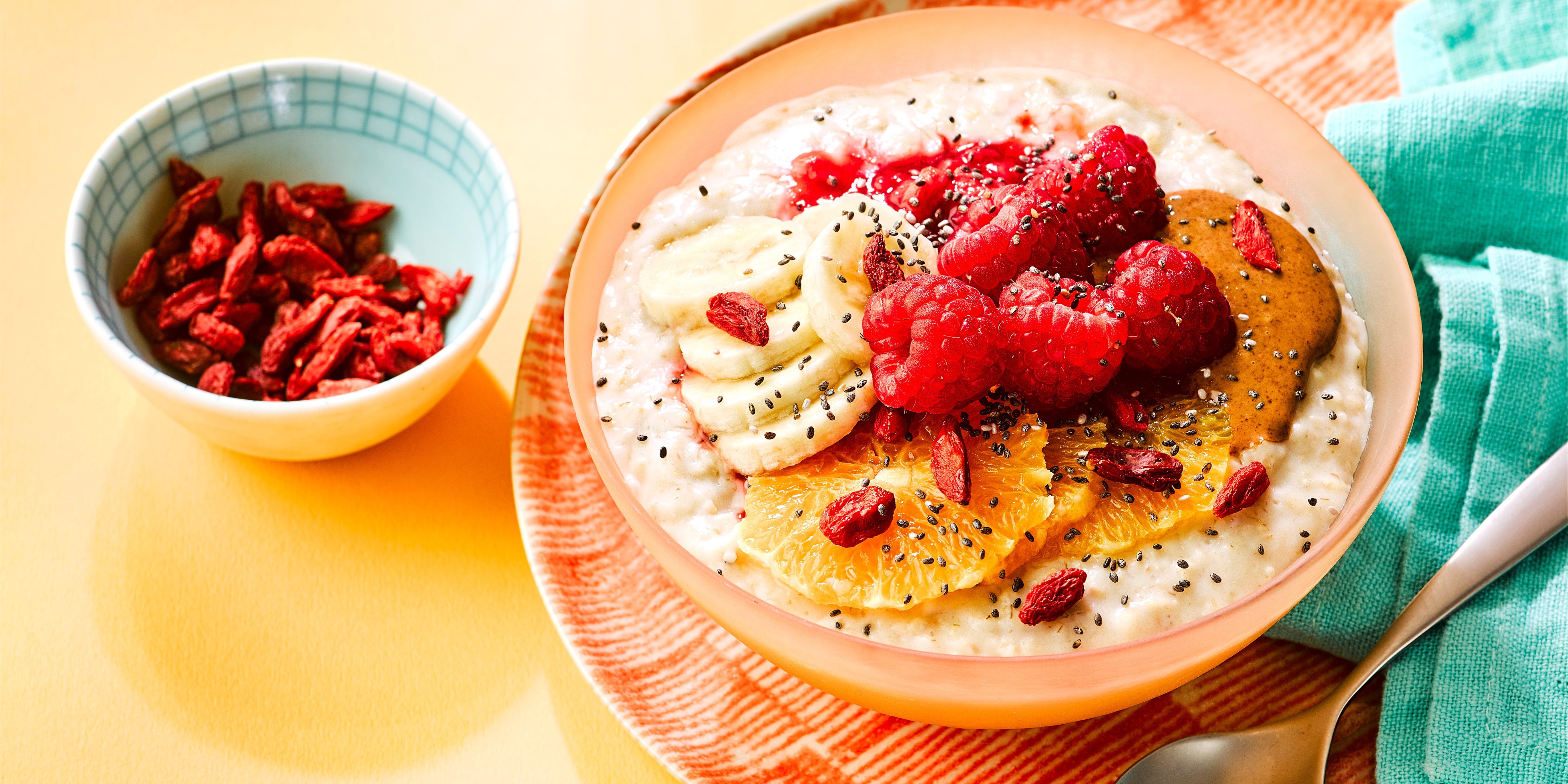Oats in a bowl, illustrating a cheap and versatile grain for breakfast and baking