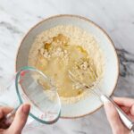 Chickpea flour and water in a mixing bowl