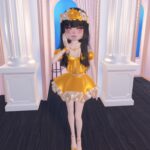 Orange juice inspired outfit with a ruffled mini-dress, butterfly top, and orange accessories, capturing the bright and tangy essence of the drink