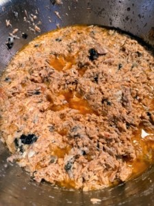 Cooked salmon with bones removed for dog food