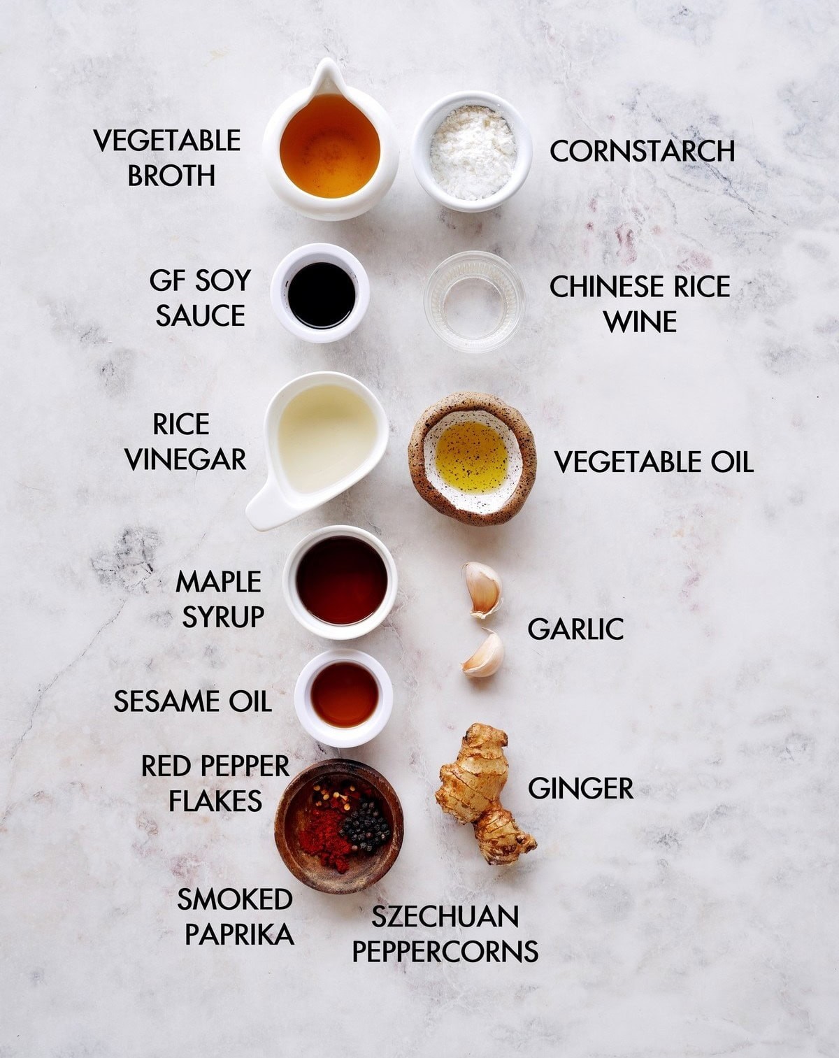 Ingredients for making Chinese garlic sauce, including garlic, soy sauce, vinegar, and sugar