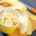 A close-up shows vibrant, ripe bananas ready to offer their energy. Their bright yellow skin promises a nutritious start to any morning.