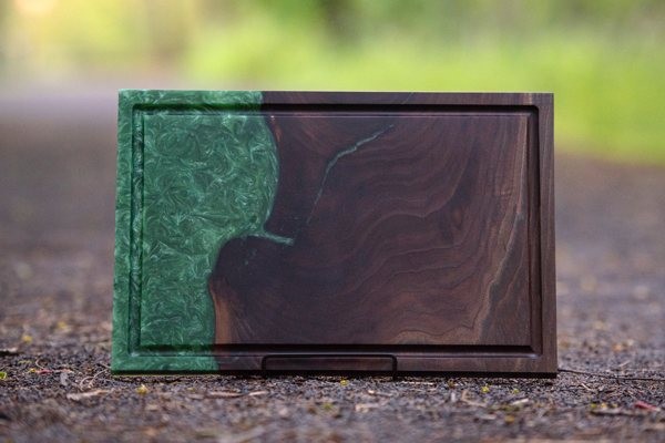 Serving tray with epoxy resin ornamentation.