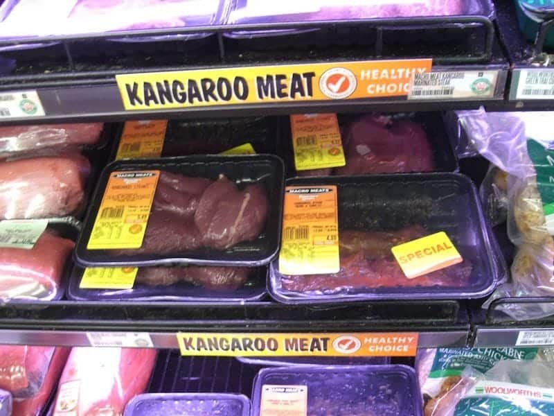 Kangaroo meat, a lean red meat commonly found in Australian supermarkets, displayed on a shelf.