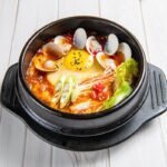 Kimchi Jjigae, a spicy Korean stew made with fermented kimchi and chili paste