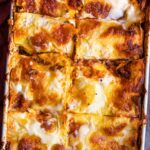 Overhead view of a freshly baked Italian lasagna with bubbly cheese