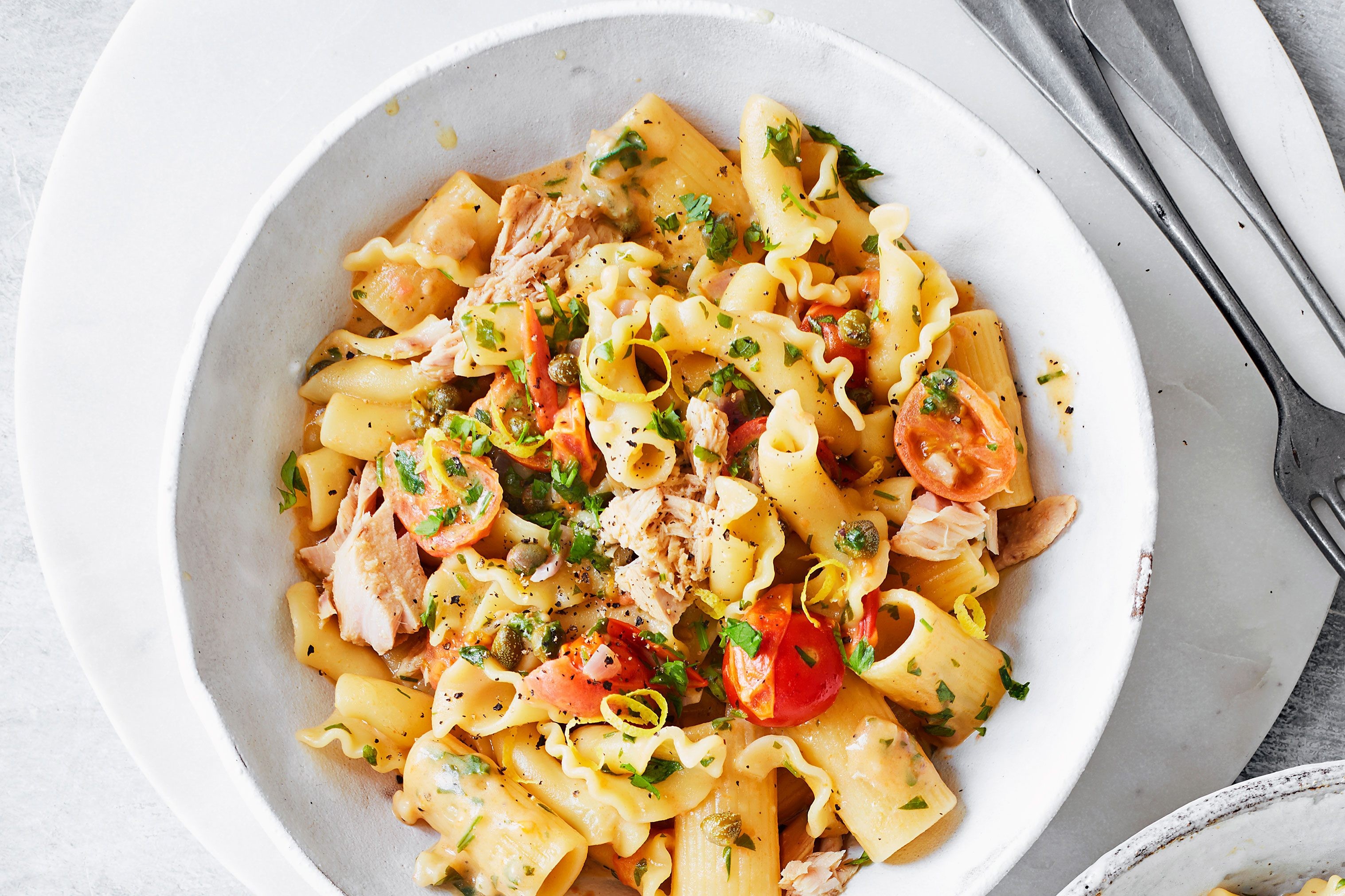 Rigattoni with tuna, tomatoes, and capers.