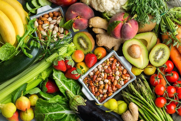 A vibrant assortment of nourishing foods, showcasing a variety of fruits, vegetables, proteins, and whole grains, symbolizing the importance of a balanced diet for recovery after a C-section