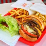 In-N-Out burger protein style wrapped in lettuce instead of a bun, perfect for a low-carb diet