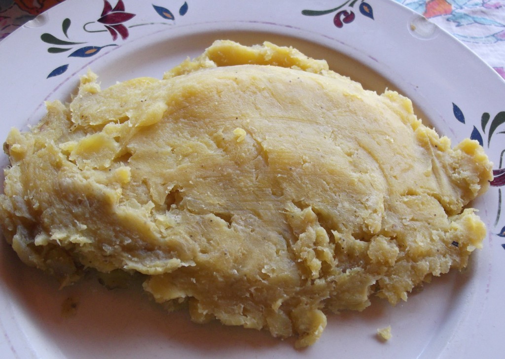Steaming matooke, a staple in Ugandan cuisine, providing essential nutrients and carbohydrates