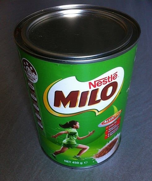 Milo, a chocolate powder used to make a chocolate drink, showcasing its iconic green tin.