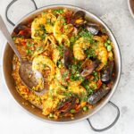 Paella with prawns, mussels, peas and other seafood