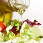 Olive oil and salad for a healthy diet