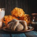 Pan de muertos adorned on an ofrenda