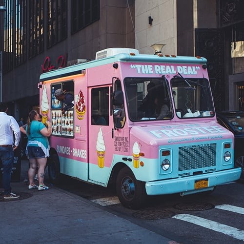 People ordering food from a food truck