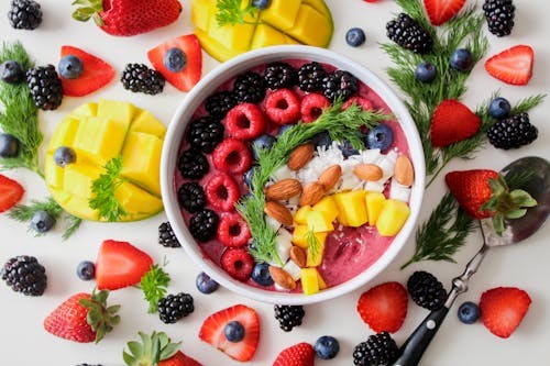 Assortment of iron-rich plant-based foods like spinach, lentils, and nuts