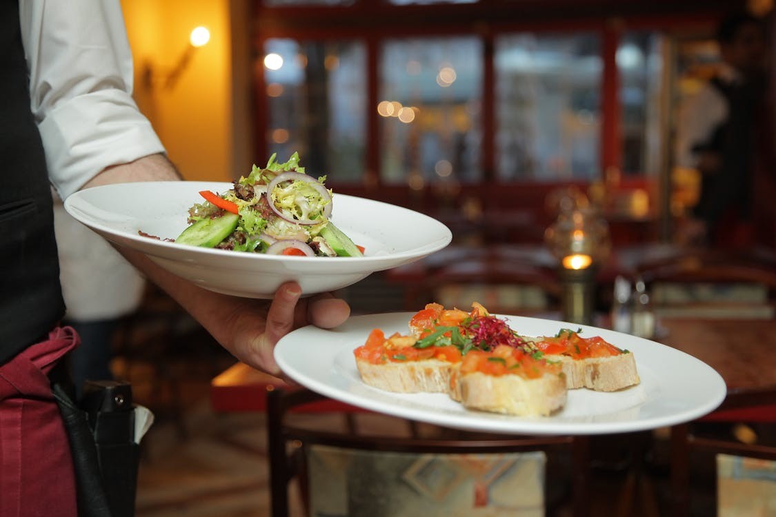 Assorted Food on White Ceramic Plates