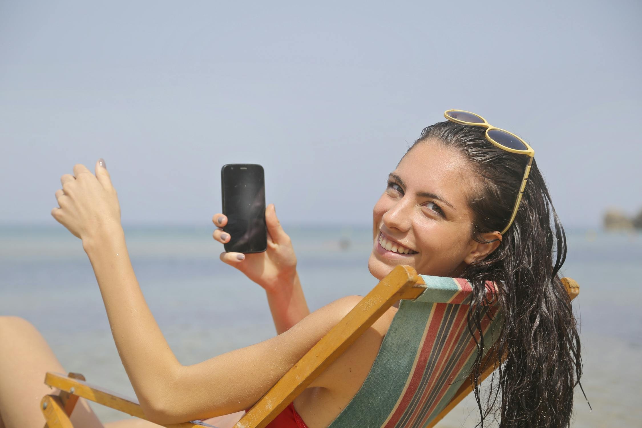 Person holding a calculator and documents