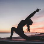 A person practicing yoga in a peaceful setting