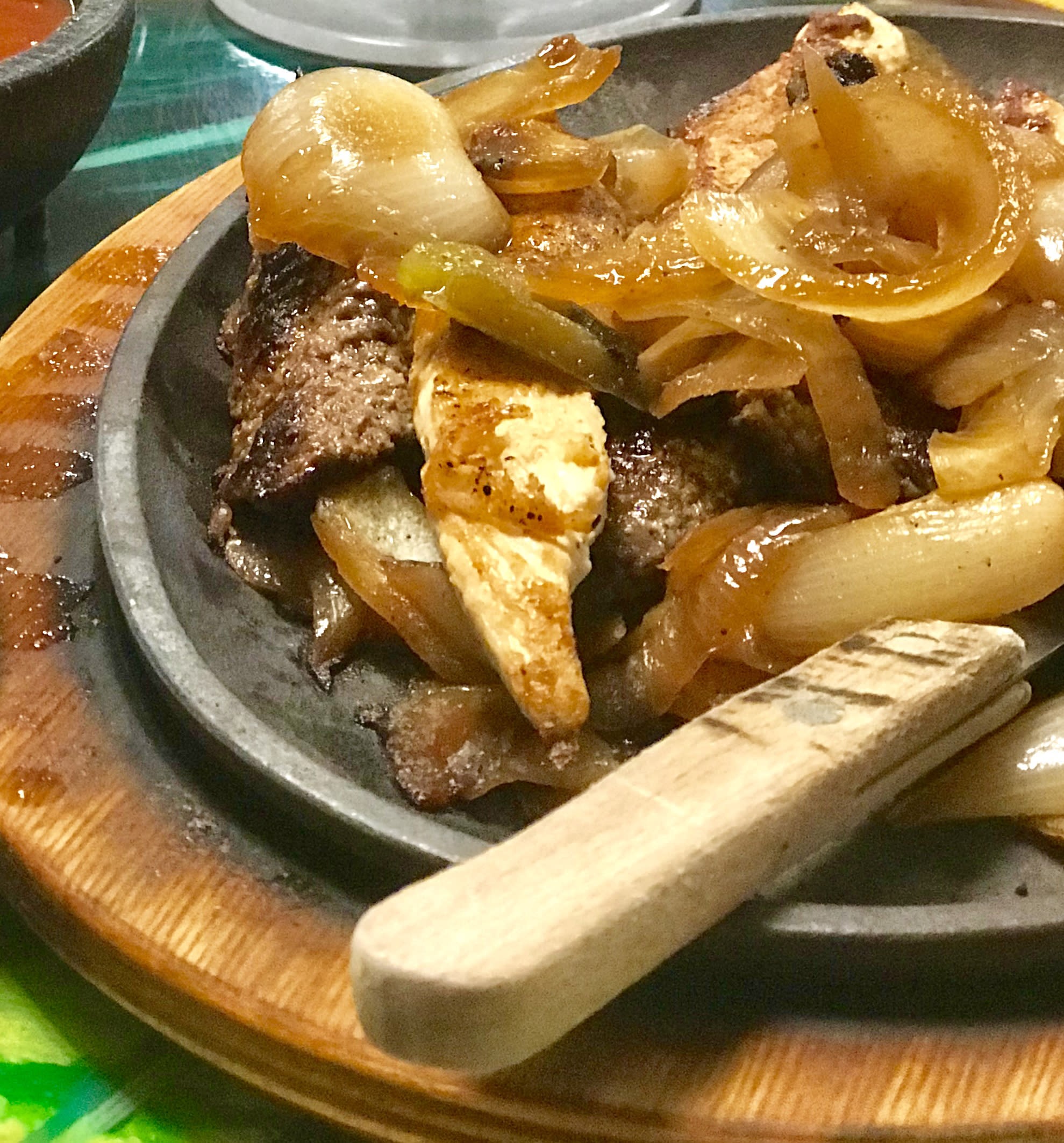 Sizzling beef fajitas from Carmela's highlighting the restaurant's Tex-Mex cuisine