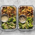 Assortment of meal prep containers filled with various foods.