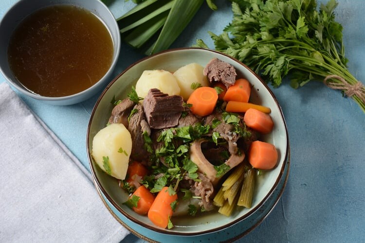 Traditional French Pot au Feu with beef, vegetables, and broth