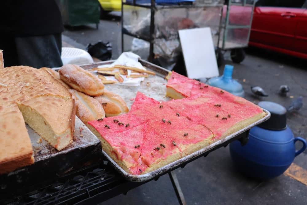 Cakes on display with bees