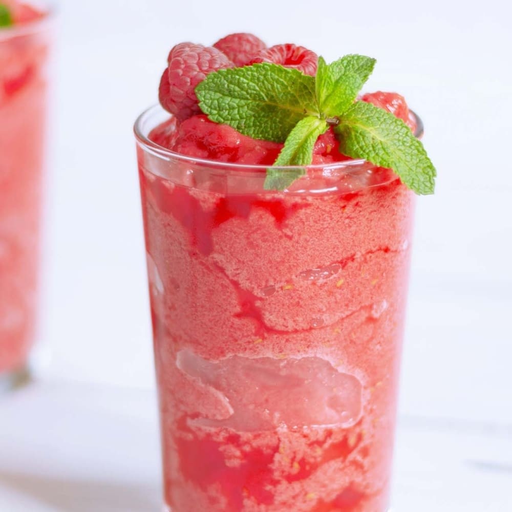 Refreshing Raspberry Lemonade Slushie, made effortlessly in a Ninja Food Processor