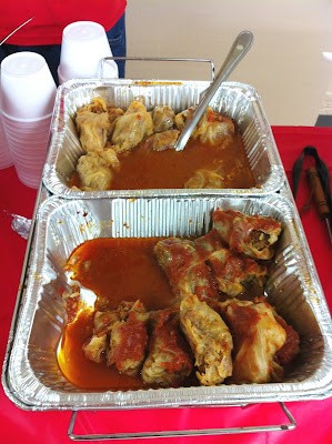 Stuffed cabbage rolls, known as Golubtsi, simmered in a tomato sauce